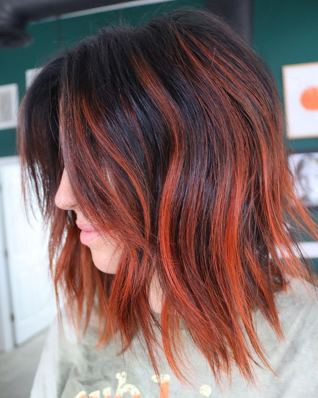 Black Hair with Bright Auburn Highlights