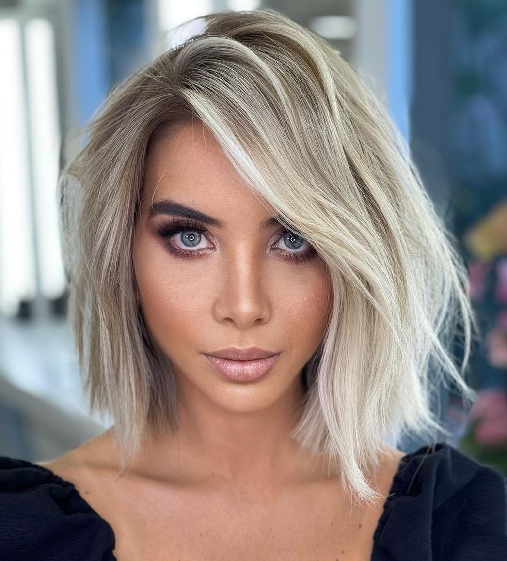 Asymmetrical Ash Blonde Bob with Highlights